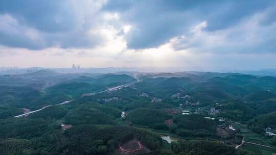 丘陵群山夕阳落日乌云密布航拍延时风光