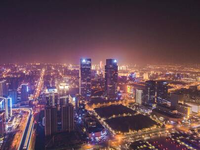 郑州东站双子塔城市夜景无人机航拍延时摄影