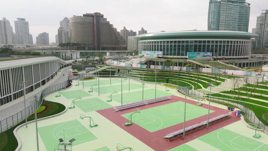 4K航拍上海体育场徐汇体育公园室外篮球场视频素材模板下载