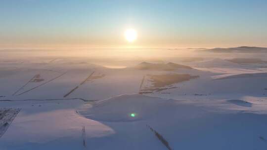 航拍4K东北雪域雪原日落