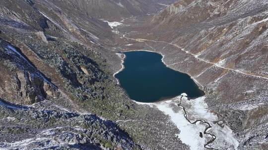 航拍雪后的川西贡嘎山乡高原海子风光