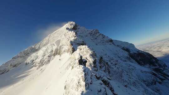 FPV航拍巍峨雪山勇攀高峰自然风景