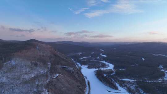 航拍黎明林海雪原冰封河流