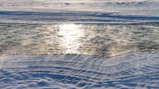 雪地不冻河冬日暖阳寒潮雾气