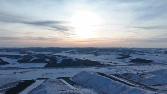 延时航拍内蒙古冬季雪原暮色