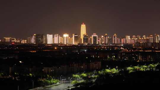 城市高楼大厦郑州CBD夜景亮化上升