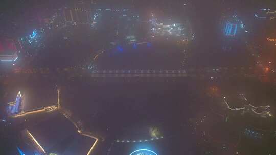 航拍平流雾云层下扬州明月湖五彩世界夜景视频素材模板下载