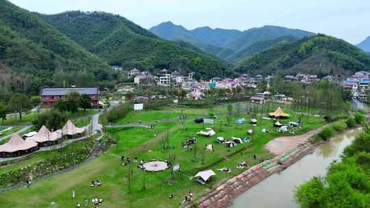 航拍山林露营基地帐篷草地帐篷