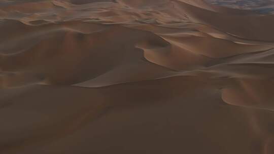 航拍黄昏时的新疆库木塔格沙漠视频素材模板下载
