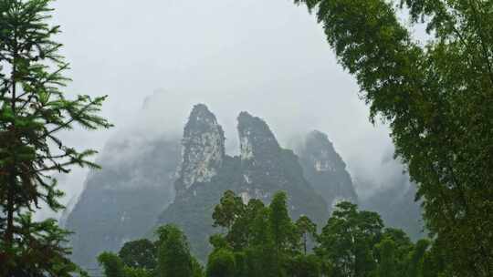 农村下雨雨景远山云雾雨季小雨