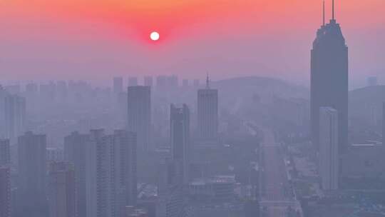 航拍枣庄早晨太阳升起的雾霾天气