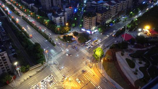 城市交通十字路口夜景车流4k视频航拍