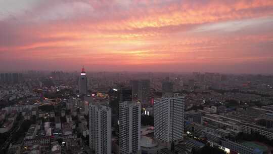 山东济宁城市晚霞夜幕降临航拍