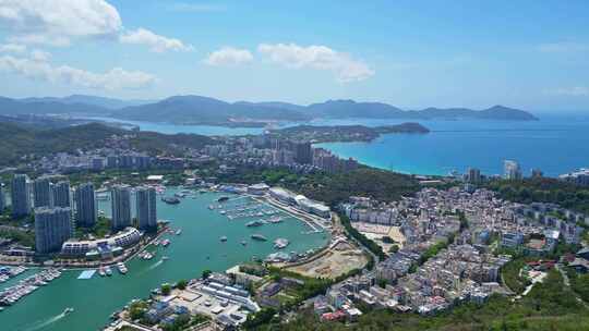 海南三亚航拍蓝天白云三亚湾城市凤凰岛海洋