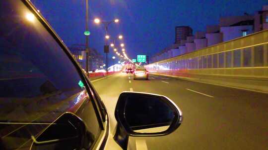 城市夜晚汽车在马路上行驶夜景视频素材