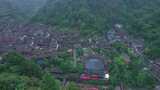 湘西德夯风景区云雾缭绕的山间村落高清在线视频素材下载