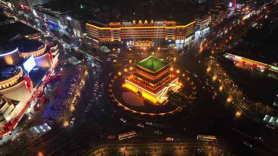 航拍陕西省西安钟楼古代建筑繁华夜景视频素材模板下载