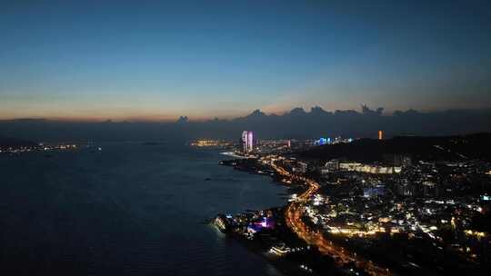 厦门环岛路夜景航拍海滨城市风光双子塔晚霞