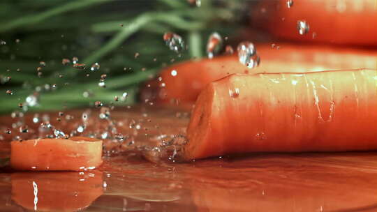 切胡萝卜菜板上切胡萝卜视频素材模板下载