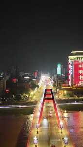 四川德阳夜景德阳彩虹桥夜景竖版航拍