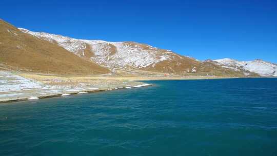 航拍西藏冬季羊卓雍措羊湖纳木错湖水与雪山