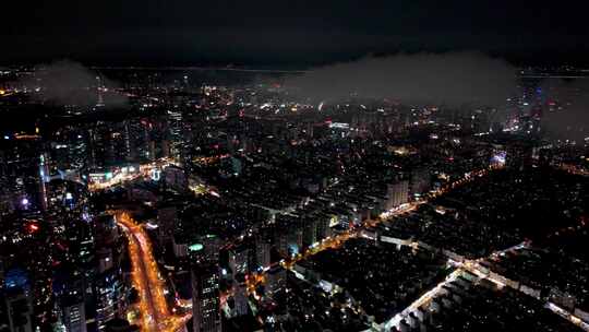 中国山东青岛城市夜景灯光秀航拍鸟瞰