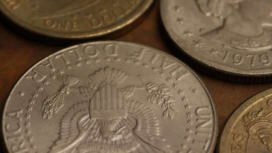 美国货币硬币的旋转库存镜头-MONEY 0350
