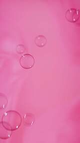 竖屏-粉红背景下的泡泡1高清在线视频素材下载