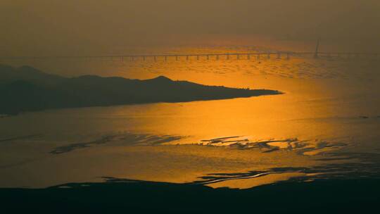 夕阳海岸视频香港米埔自然保护区港珠澳大桥