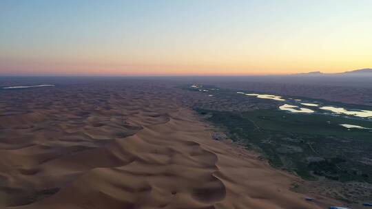 内蒙古阿拉善腾格里沙漠日出航拍多角度视频素材模板下载