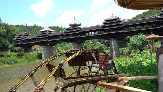 4k  三江侗族程阳八寨风雨桥和水稻田灌溉视频素材模板下载