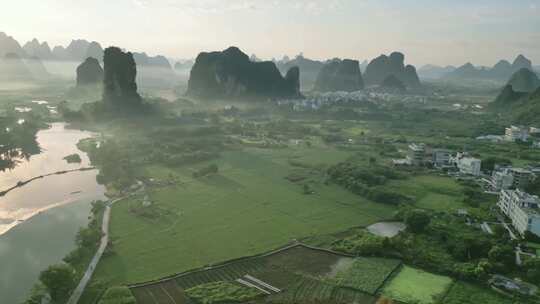 航拍视角下的田野与群山风景