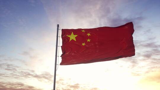 中国红旗迎风飘扬戏剧性的天空背景