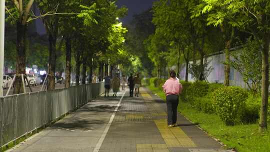 逛夜街压马路小姐姐背影视频素材模板下载