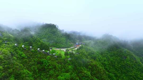 航拍大自然山林间的巍峨山峰俯瞰4k素材