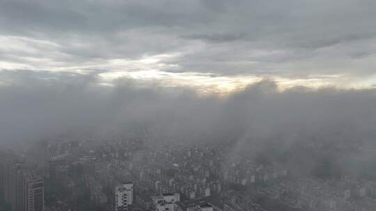 浙江湖州城市地标云雾笼罩下的城市鸟瞰全景