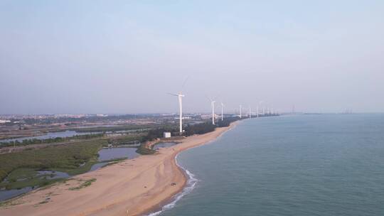 飞向海边沙滩风力大风车