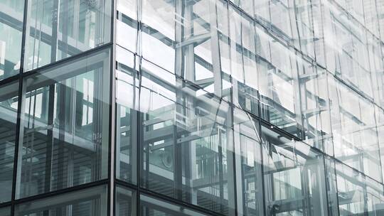 现代玻璃幕墙办公大楼观光电梯