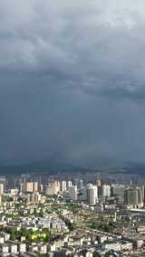 竖版航拍城市夏季暴雨来临湖南怀化高清在线视频素材下载