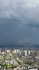 竖版航拍城市夏季暴雨来临湖南怀化高清在线视频素材下载