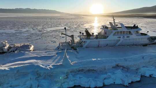 青海海南青海湖船只落日冰雪航拍视频