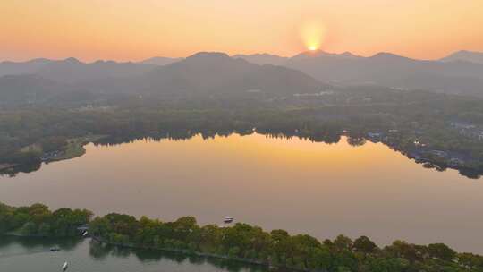 唯美夕阳西下杭州西湖苏堤航拍美景大自然风