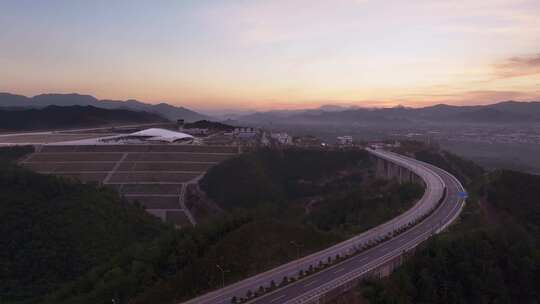 夕阳下建设中丽水机场航拍