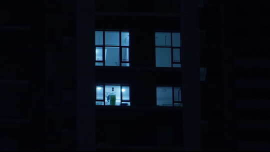 夜晚小区居民楼住宅楼灯光