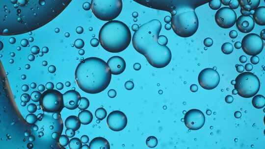 蓝色工业油液体油分子倒入特写