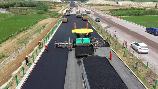 高速公路施工道路养护沥青摊铺压路机视频素材模板下载