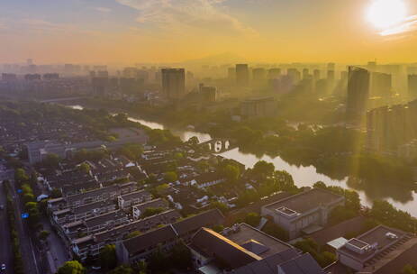 航拍延时夕阳杭州拱墅区京杭运河拱宸桥