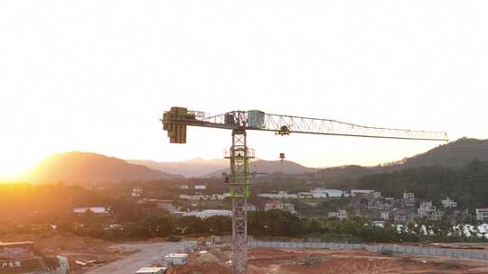 建筑工地航拍乡村建设农村开发吊塔日出工地