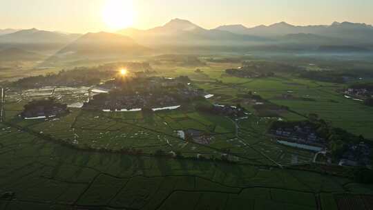 中国侨乡广东台山乡村稻田山脉山峰日出航拍