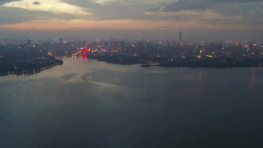 航拍武汉东湖梅园码头傍晚灯光湖面城市远景